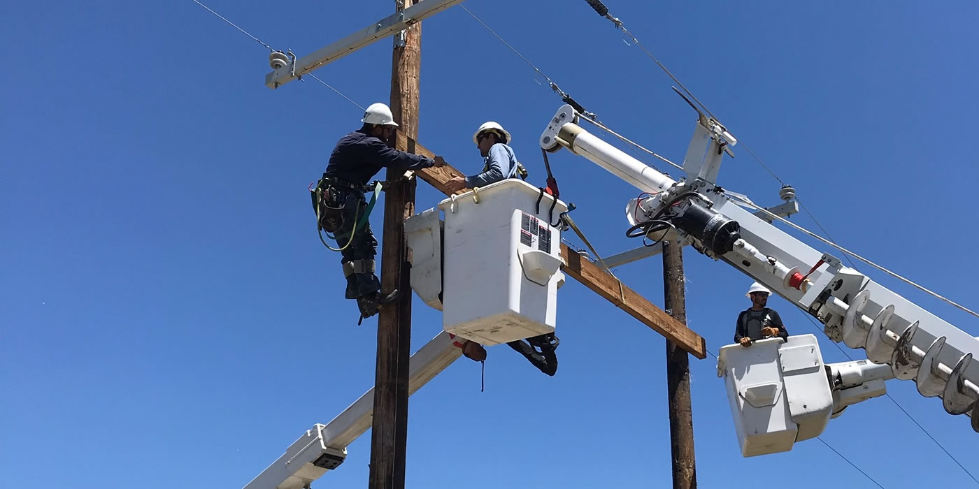 Lineman working on a pole